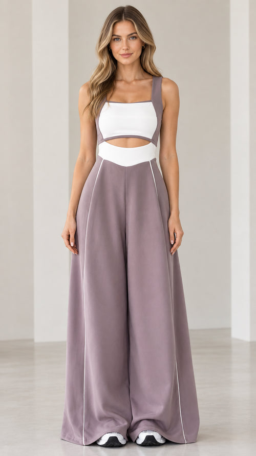 Front full-length view of woman wearing mauve colorblock cutout wide-leg jumpsuit