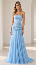 Front view of model wearing strapless sky blue pearl embellished corset gown