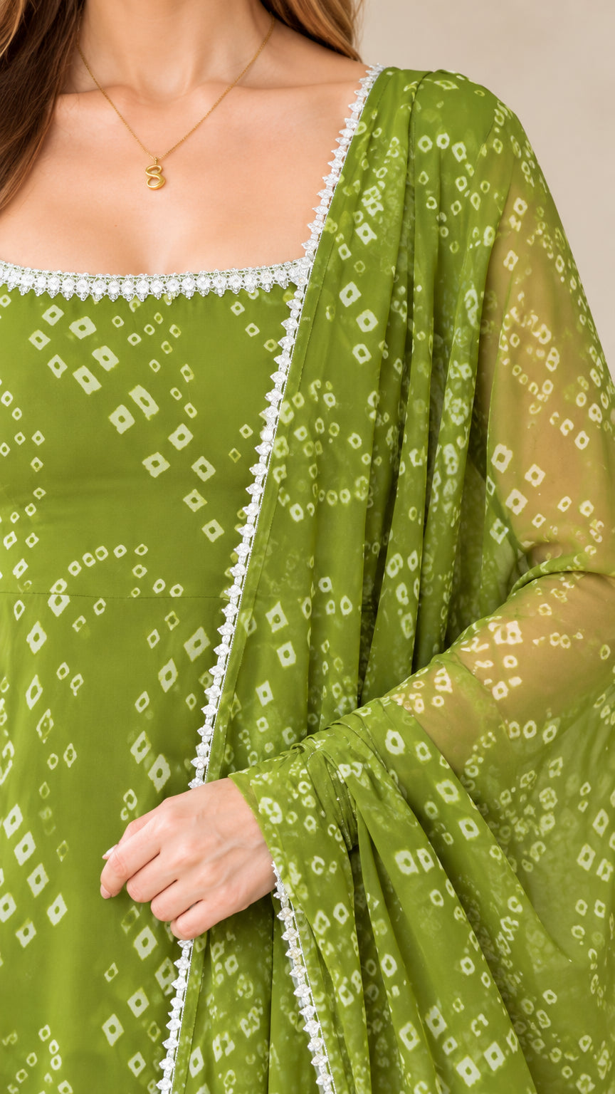 Close-up of square neckline with lace trim and printed fabric detail